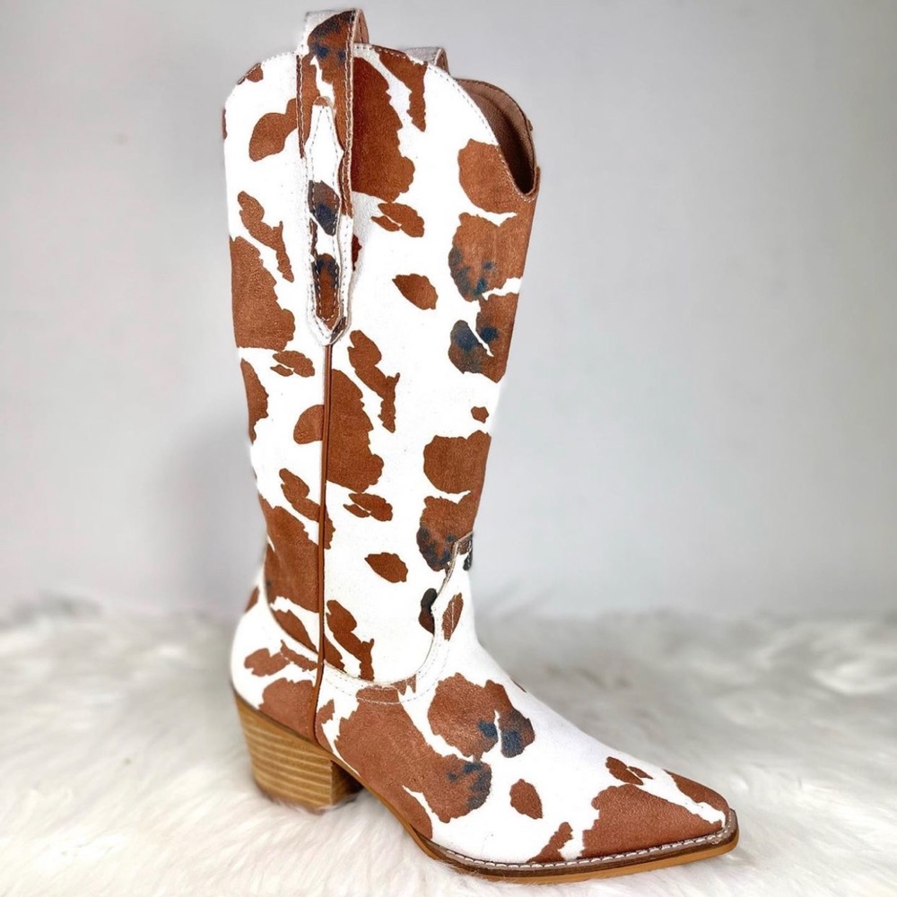 Cowprint cowboy boots